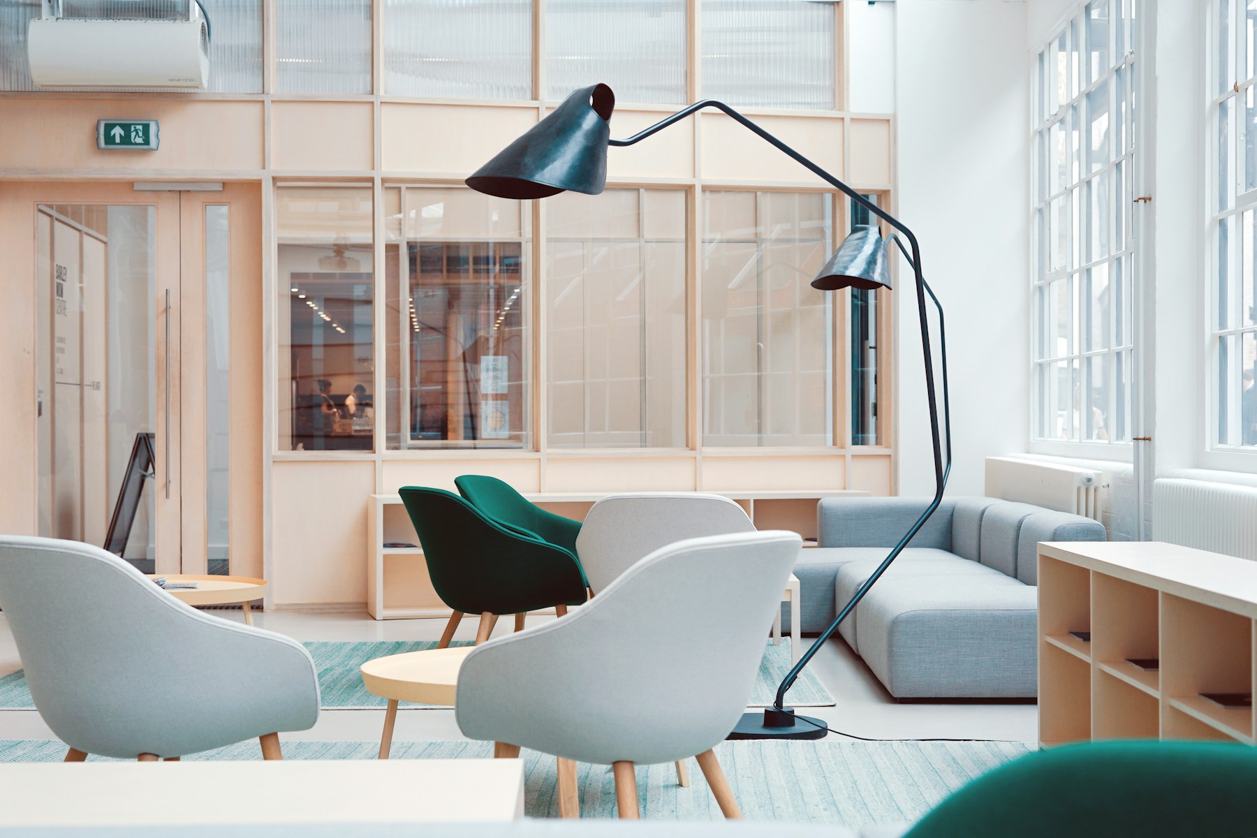 A bright studio workspace with large windows
